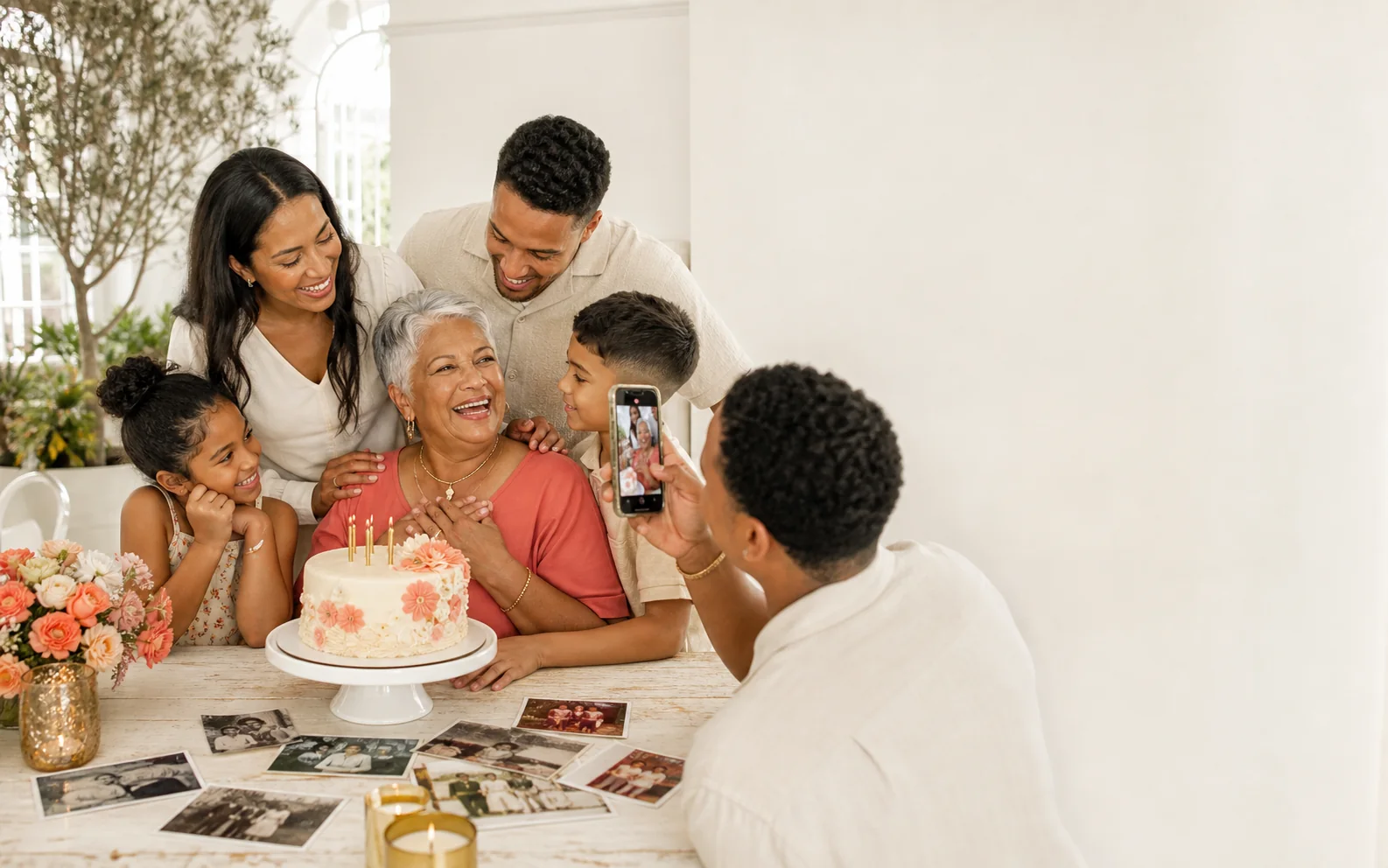 Scene: three generations recording a warm 60th-birthday memory.